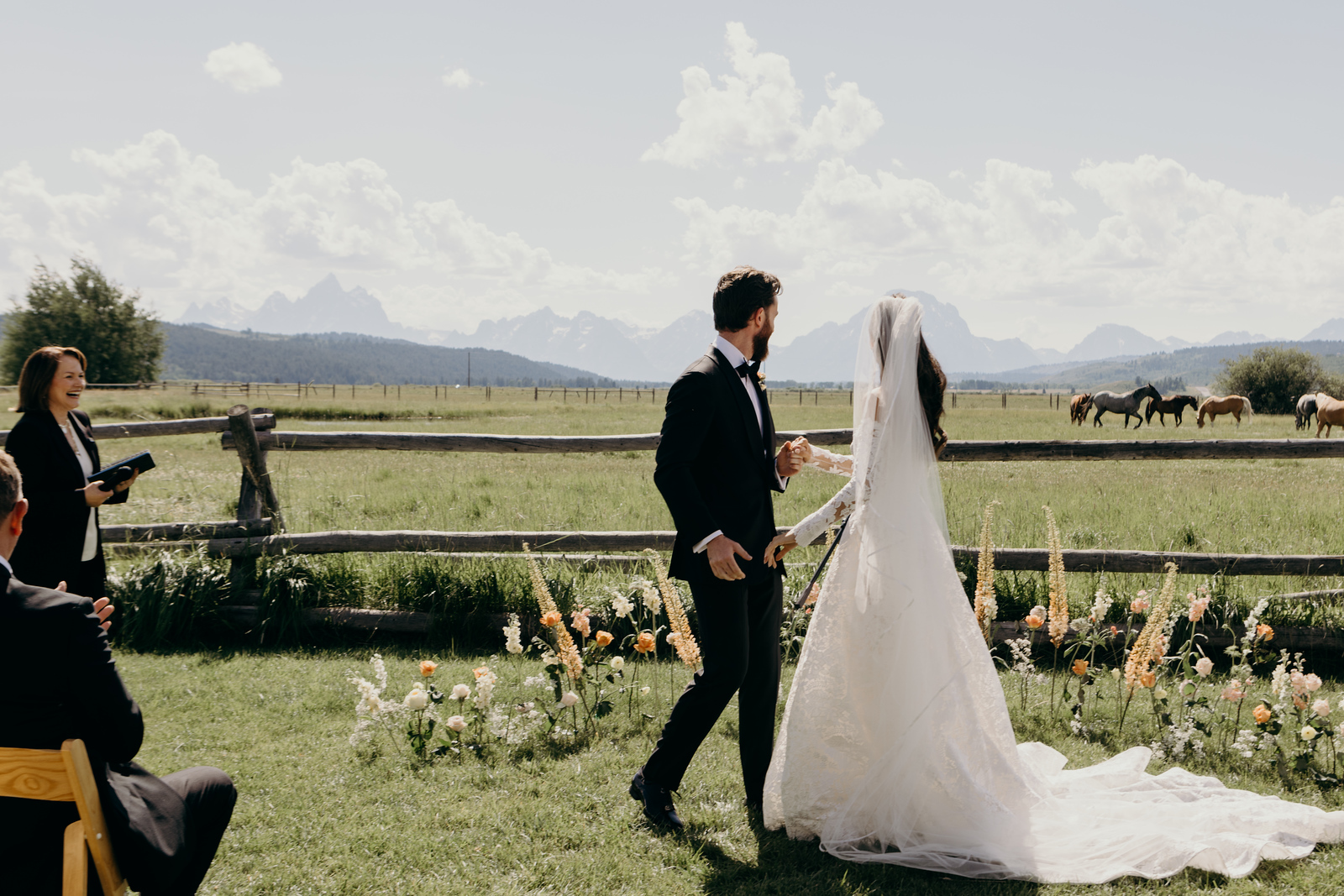 Kate and Bobby walking after ceremony
