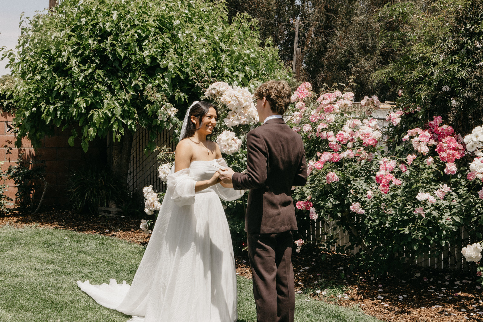 Bride and groom garden portrait